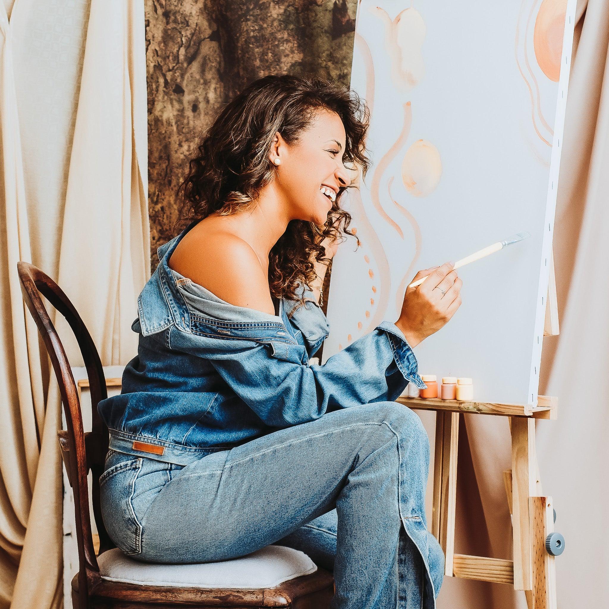 women painting in jeans - Delft Denim